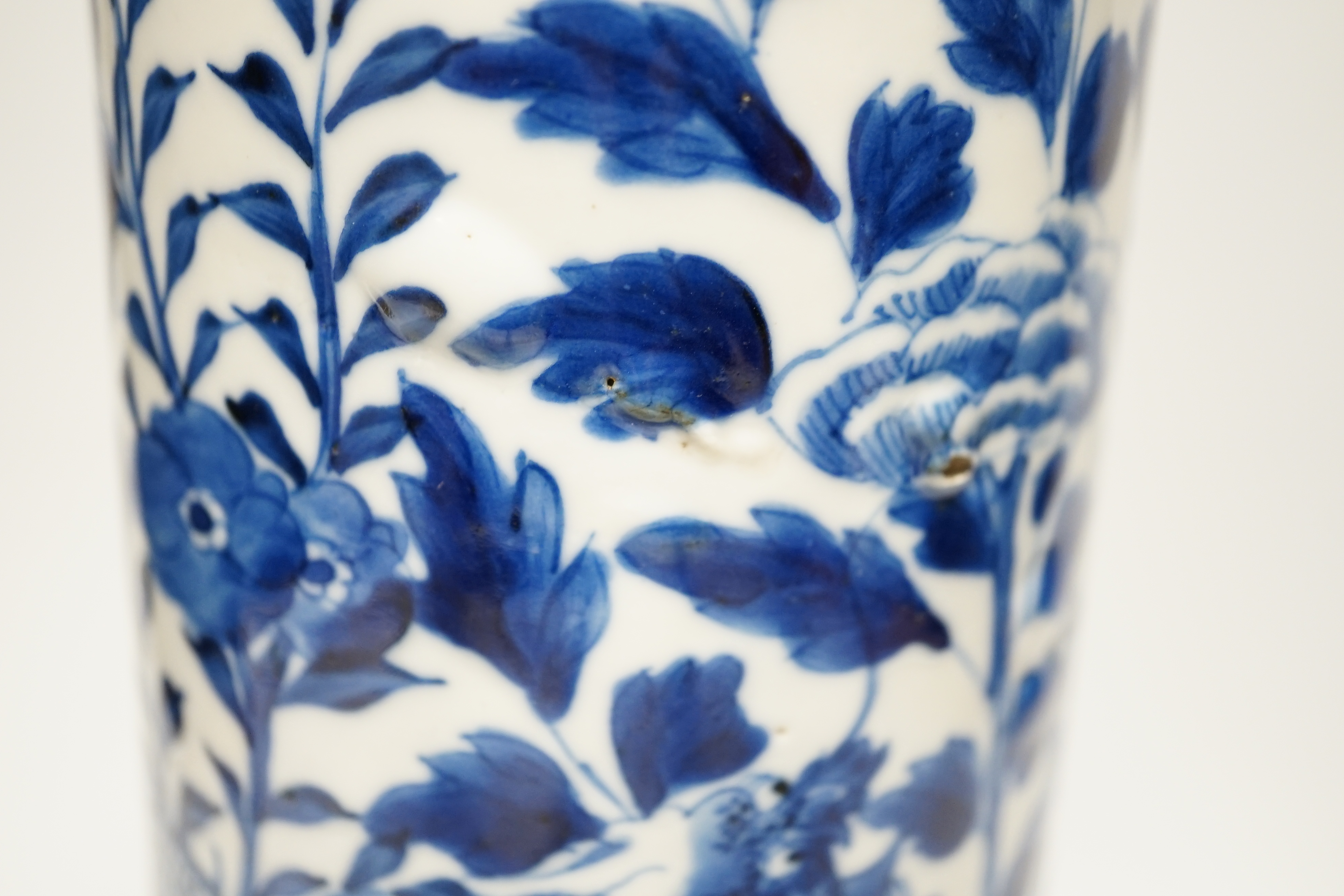 An early 20th century Chinese vase together with two small jars with covers, highest 31cm